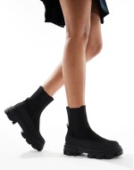 chunky sole pull on boots in black